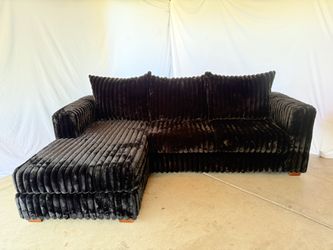 96 inch sofa with reversable chaise new