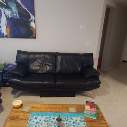 Couch And Oversized Arm Chair And Ottoman
