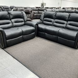 New Reclining Couch  / Love Seat .  Black Leather .  Free Delivery !