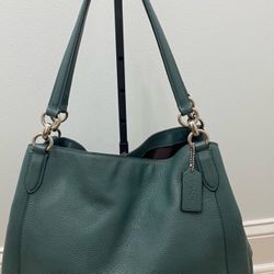 Coach Hallie Pebble Leather Shoulder Bag. Dimensions 4x10x14. Brand new without tag and dust bag 