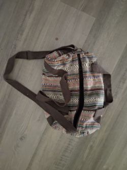 bohemian-style woven multi-colored striped fabric duffel bag