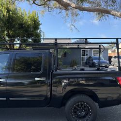 Lumber Rack, Kayak, And Long Boards