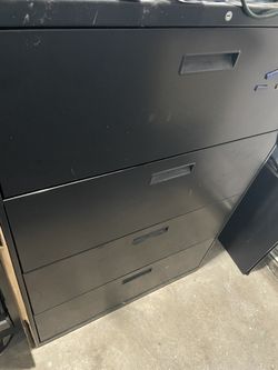 Filing Cabinet Used. Works Great. Minor Dents And Scratches 53” height 3 feet long 19” depth . $25