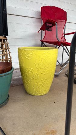 Large yellow vase planter