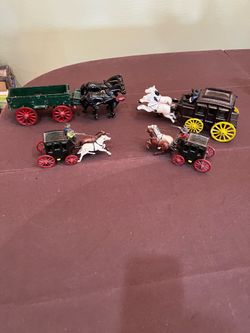 Vintage Cast Iron & Lead Toy Collection – 4-Piece Set (Stagecoaches & Wagon)