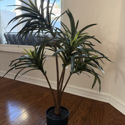 Faux palm plant