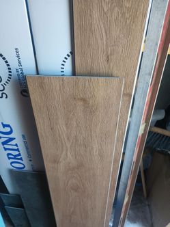 7 boxes of vinyl  Brandon new extras asking $200  is 224 square feet