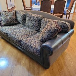 Classic comfortable western leather and cloth sofa