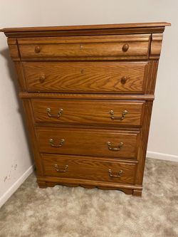 Moving, must sell. Brown 5 drawer dresser. Asking $25 OBO