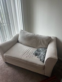 Cream loveseat