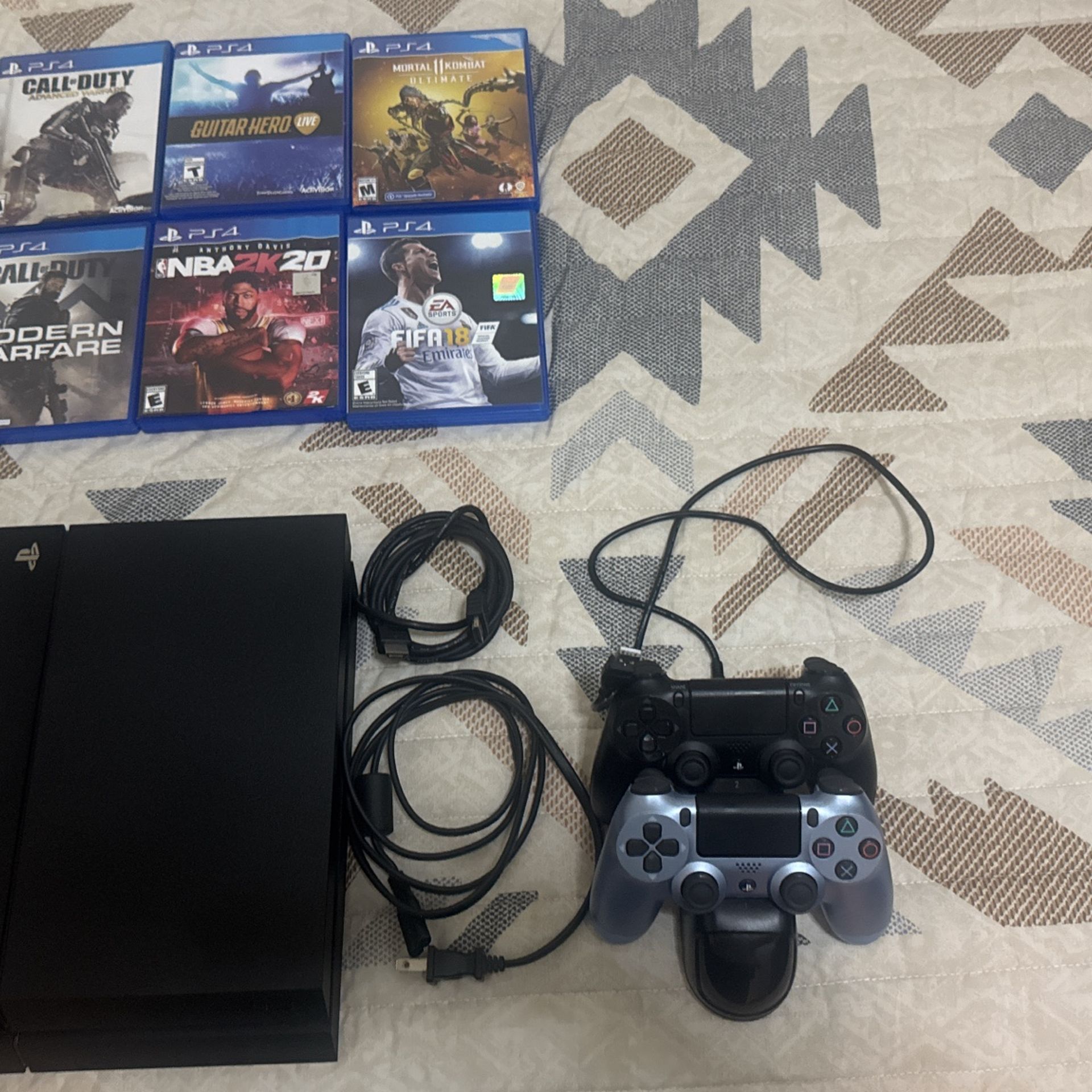 PS4 +2 Chargers +6 Games