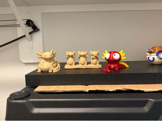 3D printed Axolotls and Pokemon figurines