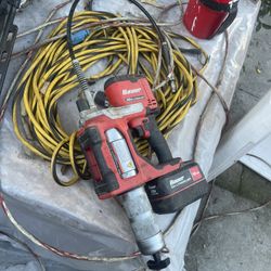 a Bauer 20V cordless grease gun and a 12 Ah high-capacity lithium-ion battery