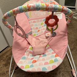 Bright stars, pink baby bouncer with hanging toys no vibration