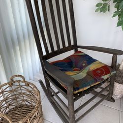 Beautiful wood rocking chair with cushion