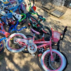 12 KIDS BIKES (don't know if they hold air,  didn't check) $50 gets You ALL 12 bikes