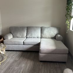 $180 ~ Reversible chase living Spaces sofa 