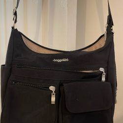 Barggallini everywhere bag, black raincoat like material seven pockets