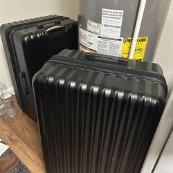 Two Identical Black Airway 30-Inch Checked Luggage – Sell as Pair or Separately