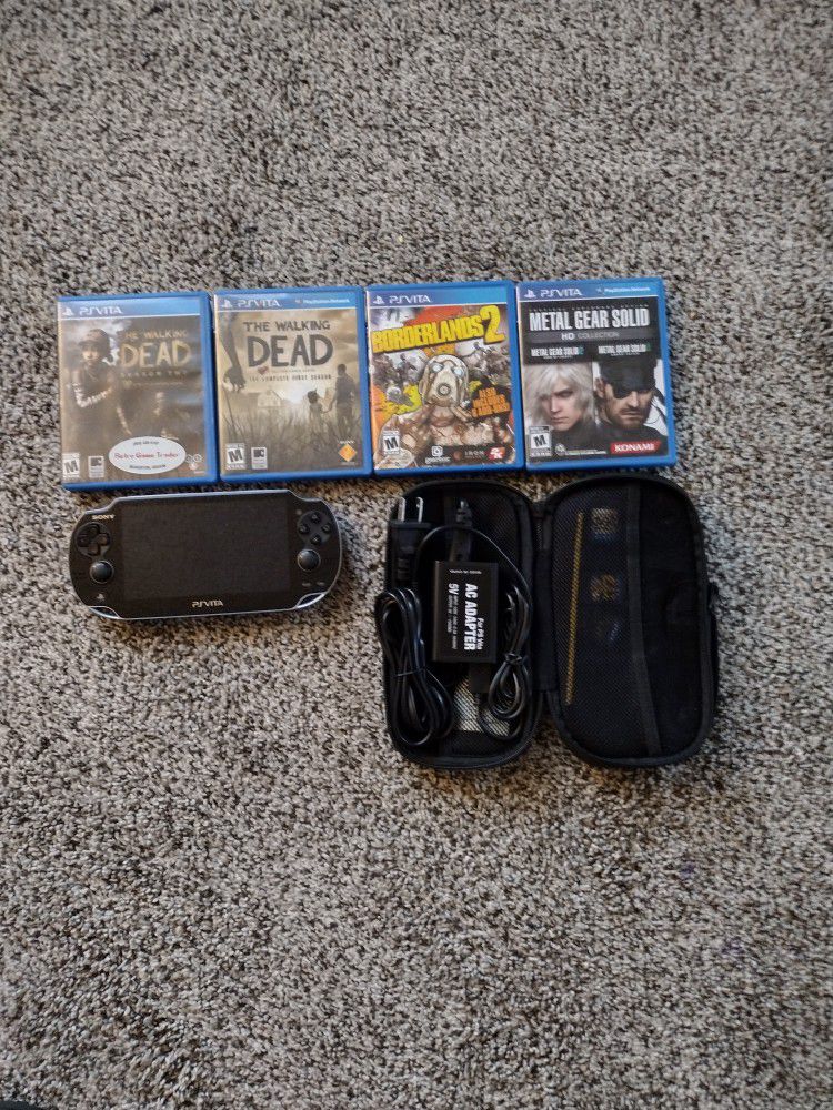 Psvita With Charger Case And 4 Games Great Condition 250$