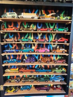 Vintage Hot Wheels Redline cars and track.