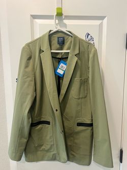 Under Armour men's blazer sport coat in green, made of spandex, polyamide, and cotton materials.