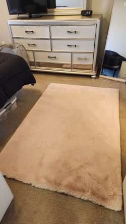 Soft and fluffy pink rug