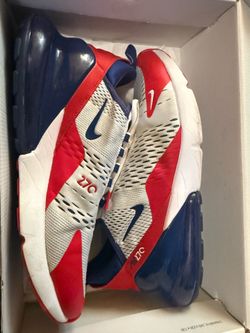 Nike air red white and blue athletic shoes