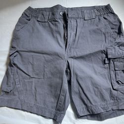 Blue cargo shorts with adjustable waist and pockets. Size: 36" 
