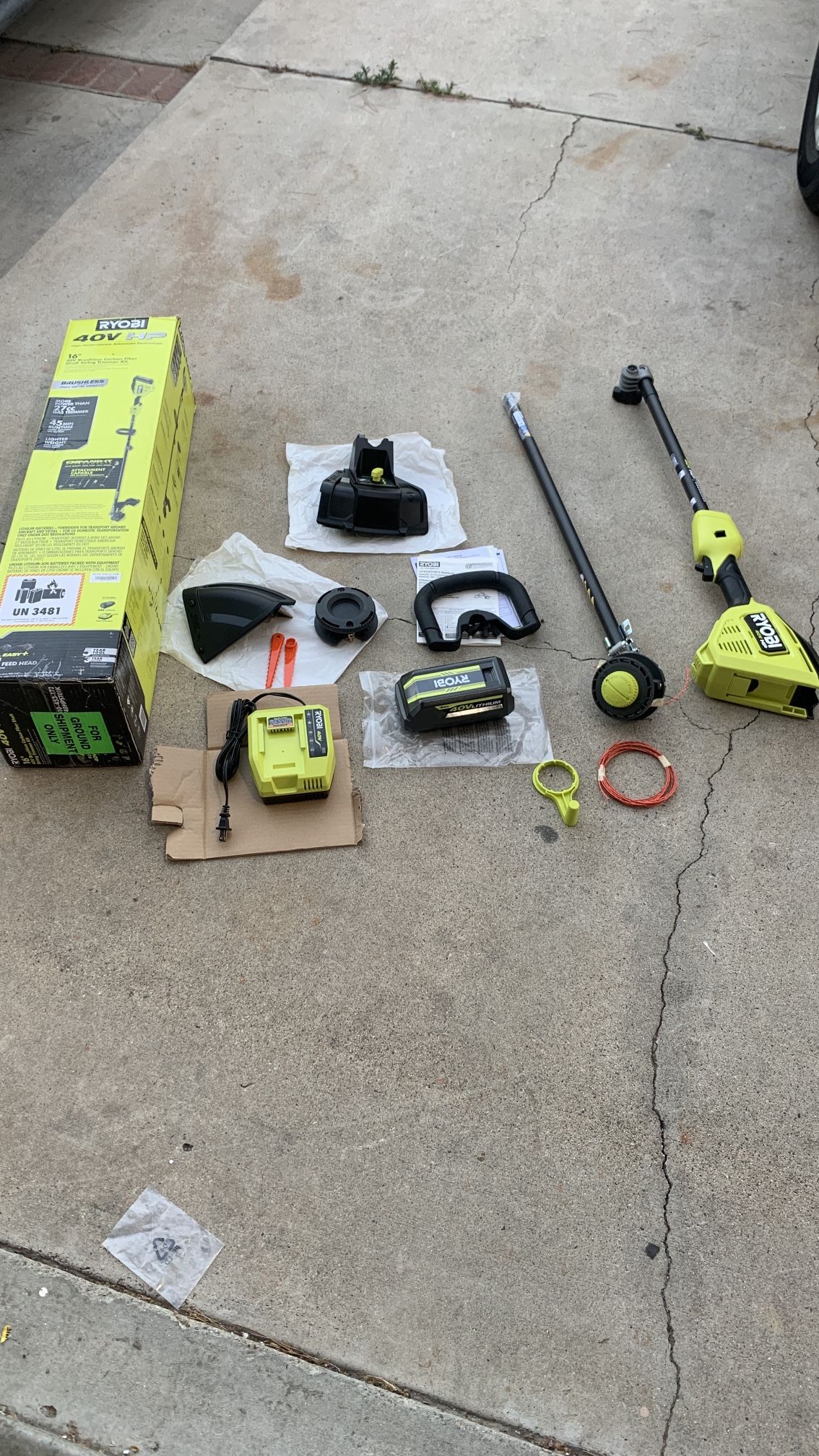 RYOBI 40V HP Brushless 16 in. Cordless Carbon Fiber Shaft Attachment Capable String Trimmer with 4.0 Ah Battery and Charger