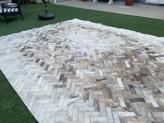 Large hide rug approx 9’ x 12’
