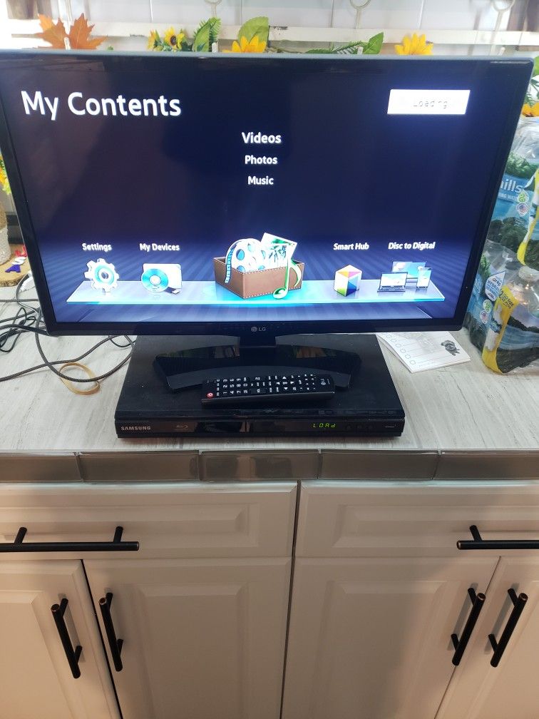 25 inch LG HD slim TV and Samsung smart DVD