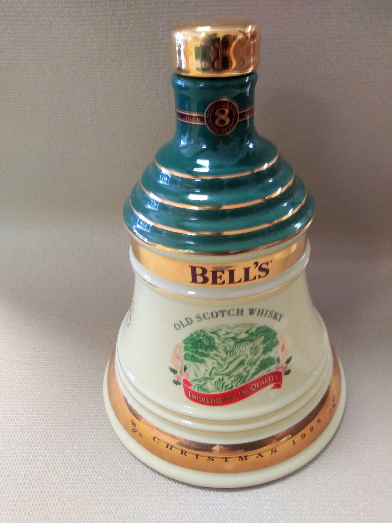 Antique bell bottle whisky