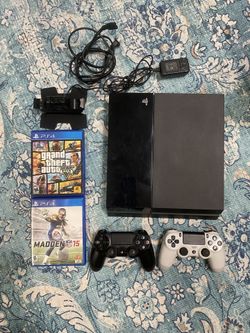 PS4 Bundle With 2 DualShock Controllers, Dual Charging Station, GTA V, And madden 15