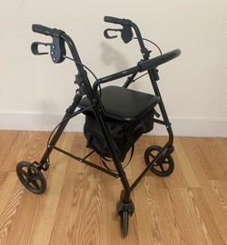 Like new Steel Lightweight Folding 4-Wheel Rollator walker in black - See pictures for details. Pick up at Ennis on North Sherman St. cash or Venmo
