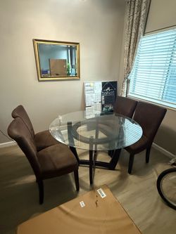 Glass dining table and chairs