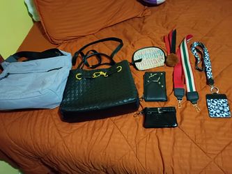 Two purses a wallet & accessories included asking $25