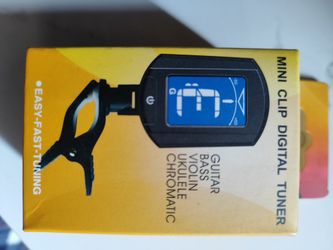 Mini Clip Digital Tuner . Guitar,Bass,Violin