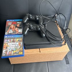 Ps4 With 2 Controllers And 2 Games 