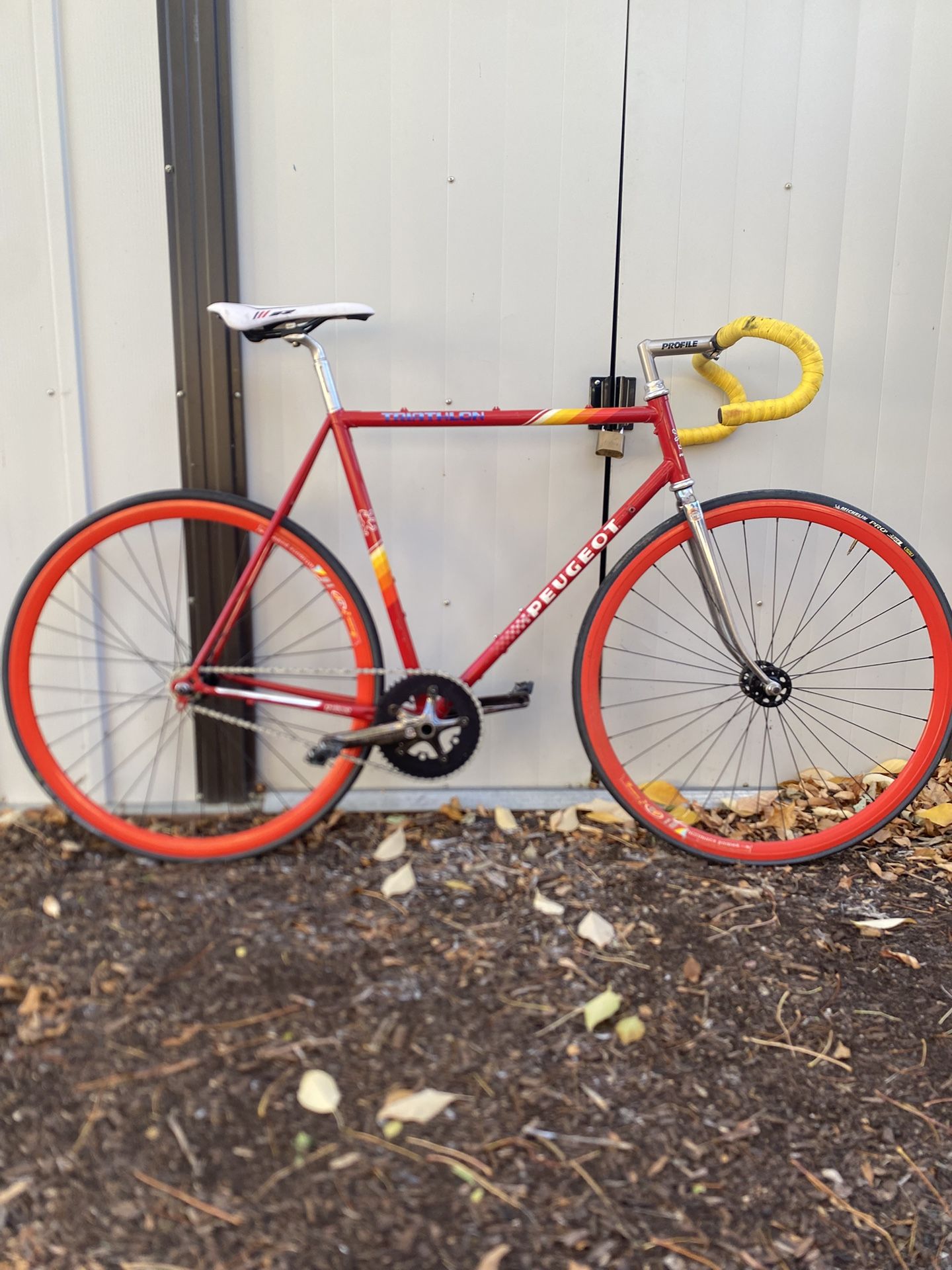 Small Vintage Red Peugeot Fix Gear Bicycle 