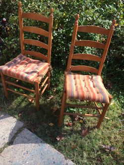 Two like new ladder back chairs
