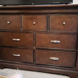 Solid wood, dark espresso, brush nickel hardware/brown 7-drawer dresser  with 2 matching 3 drawer nightstands. $50 for whole set.