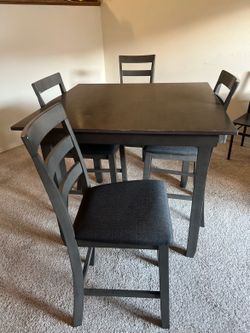 Black table with black chairs