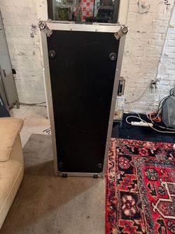 Custom DJ rolling flight case with connections