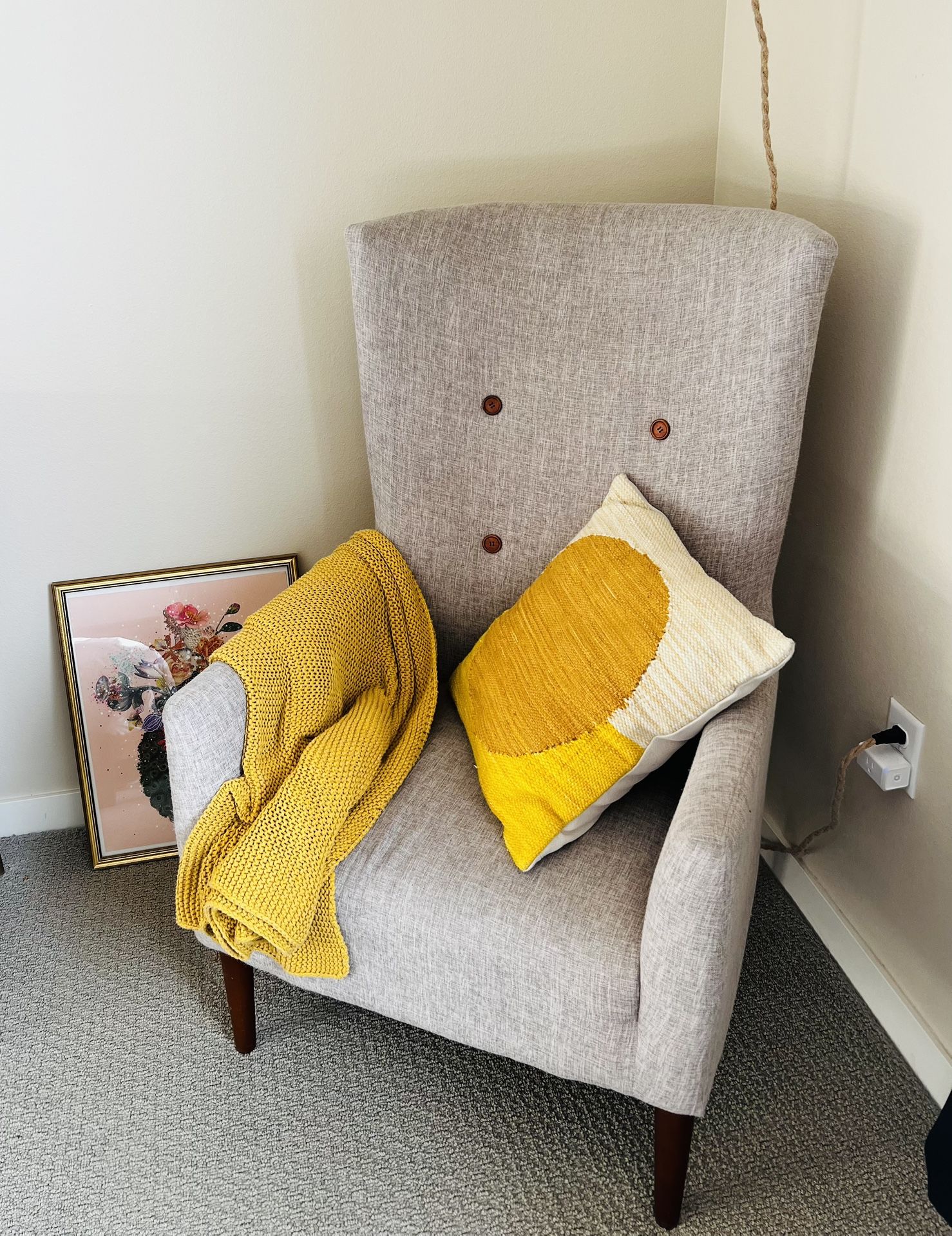 Gray Armchair with Wicker Lampshade