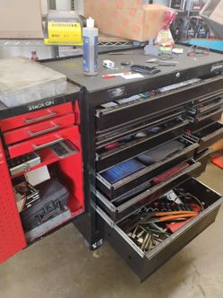 Husky tool box with several tools