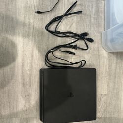 PS4 Slim (1TB), 2 Controllers, 9 Games