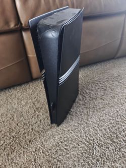 All black PS5 Pro with black controller