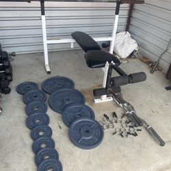 Bench And Rack With 255lbs Of Plates + Bars And Clips 