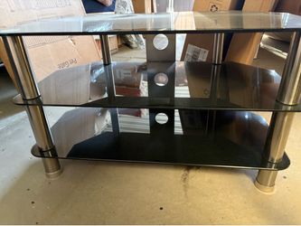 Like new small glass  tv stand